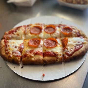 Kissed By Fire BBQ & Pizza Truck